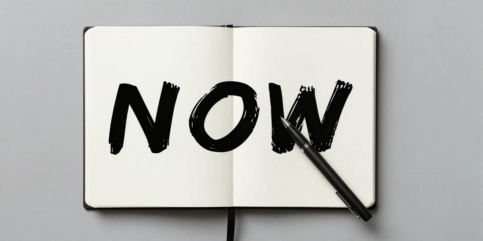 Minimalist graphic art, desk with a single notebook, a pen writing the letters N, O, W in a bold, confident, ink-brush