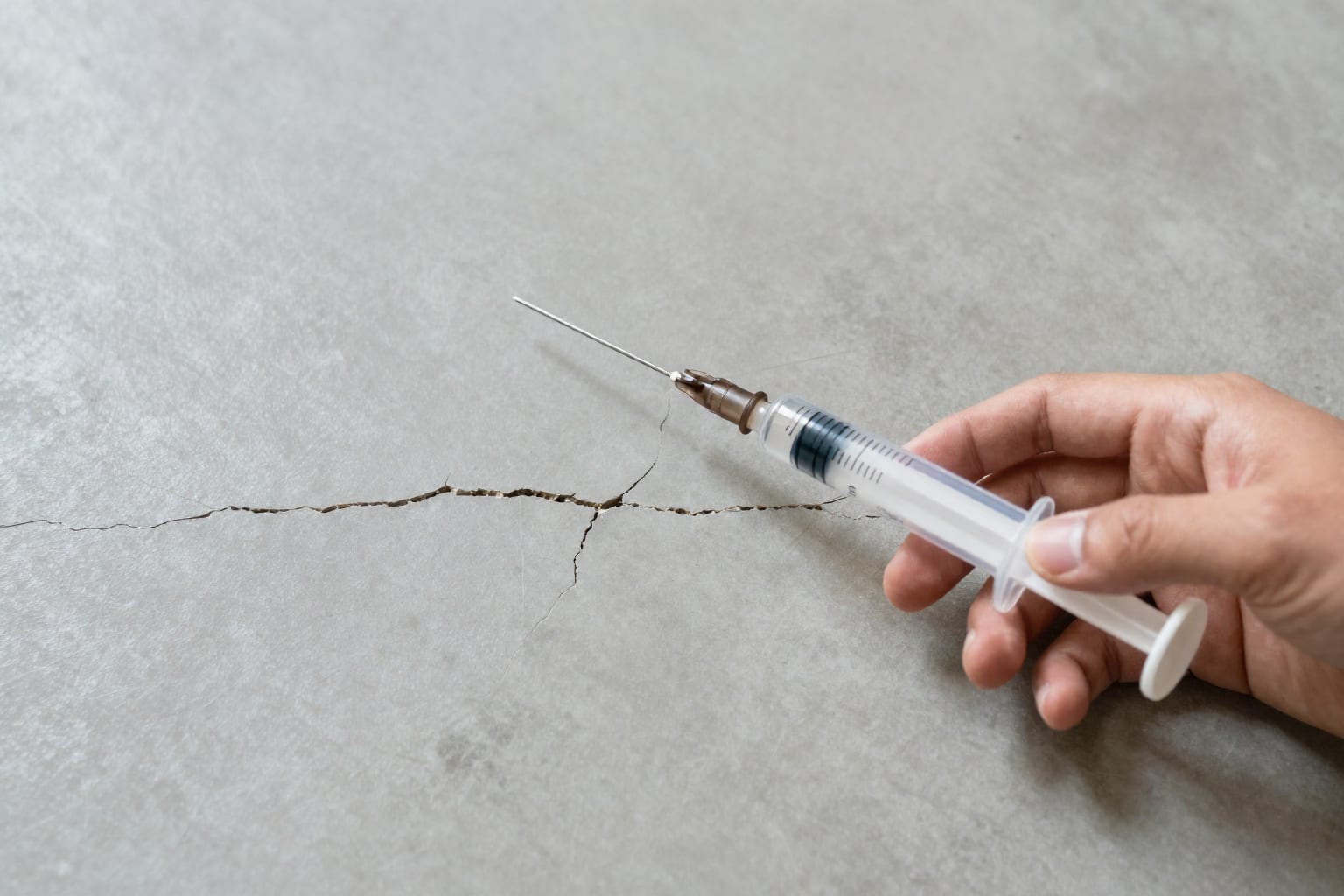 Fix a Cracking Garage Floor: 4 DIY Methods That Actually Hold Up (2026)